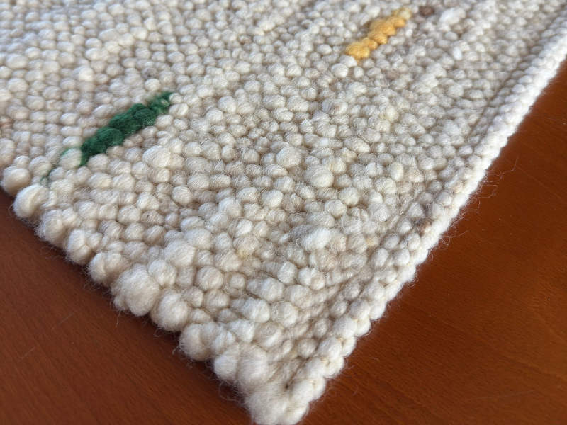 Schafwollteppich in Beige Braun hell (Karakulwolle)mit punktartigen Noppen in bunt