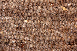 Neuseelandrückenwolle dick, dunkelbraun + weiß meliert